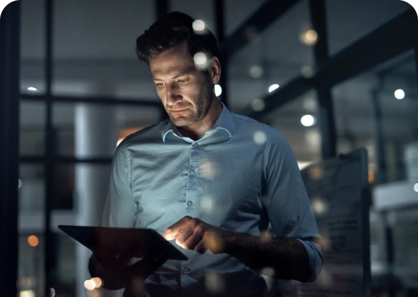 Professional focused on digital screen indoors